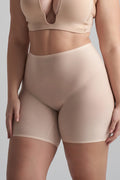 ByeBra Lengvos kompresijos besiūliai šortukai UNI STRETCH MID WAIST SHORT BEIGE